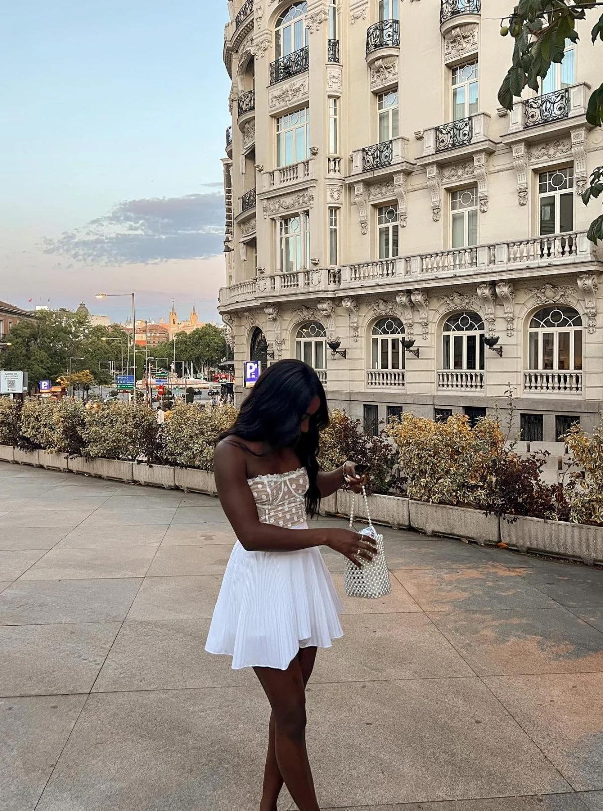 White Pleated Mini Skirt Pearl Corset Top Outfit