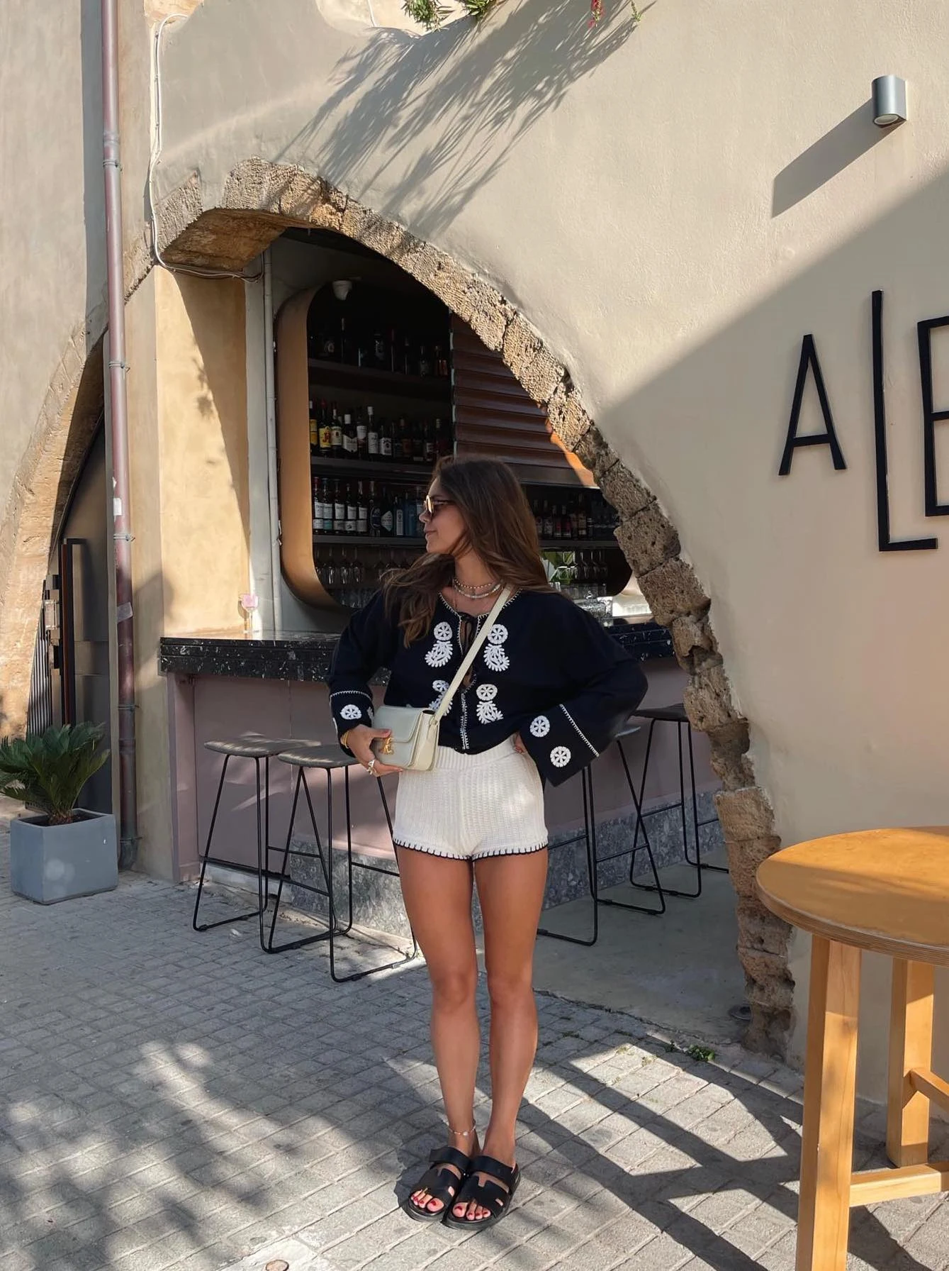 Black Embroidered Blouse Outfit with Cream Shorts